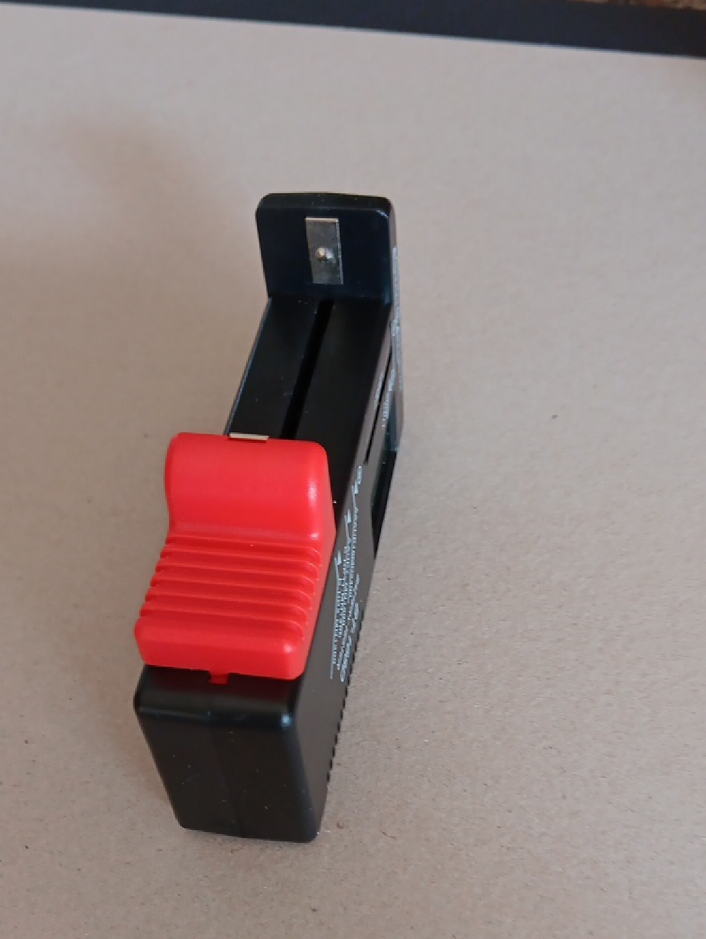 Compact Black Red Handheld Battery Tester